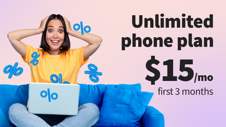 Woman holding her head happy on a blue sofa with laptop